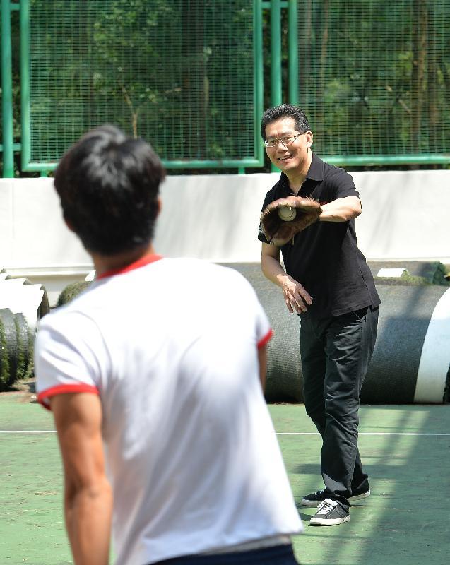 Mr So has some exchanges with a youngster who plays baseball in the film.