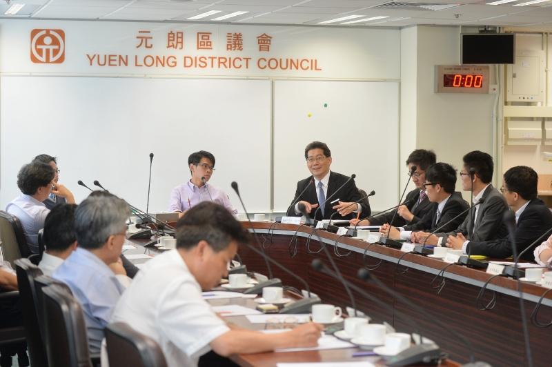 Mr So (fifth right) meets with the Vice Chairman of the Yuen Long District Council, Mr Wong Wai-shun (sixth right), and District Councillors to exchange views on district matters.